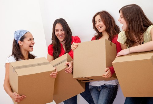 Family loading their belongings into a moving truck